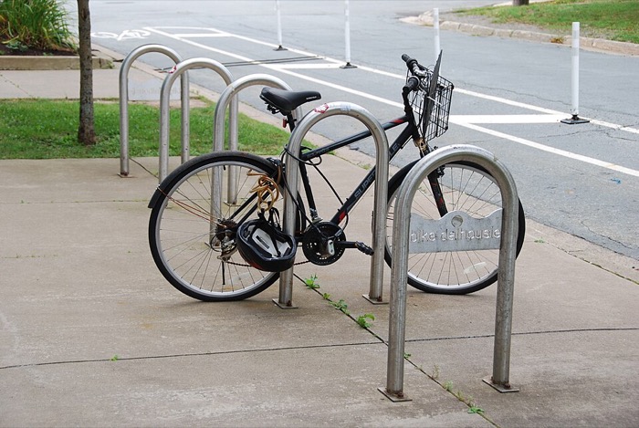bike leaning against a wooden building